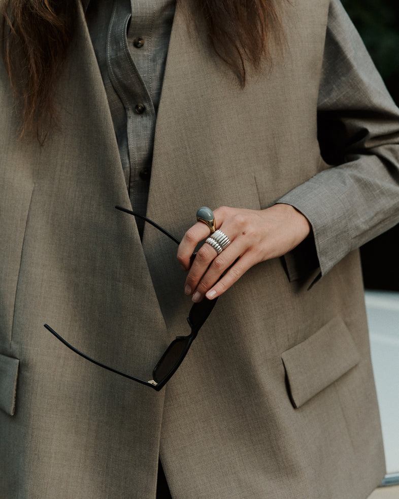  Large gold plated ring with grey enamel 