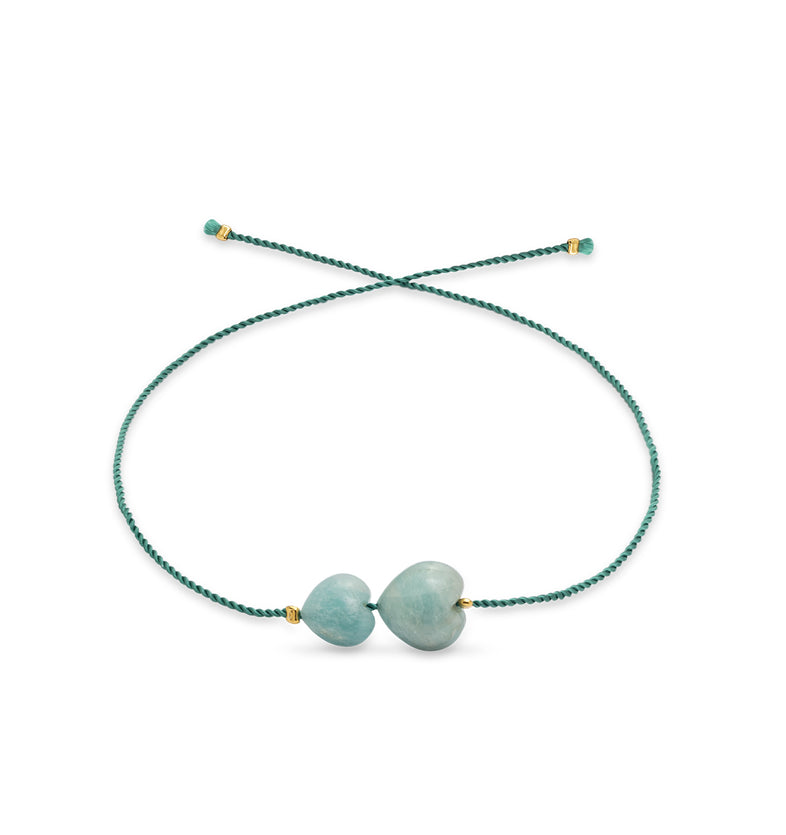  An ankle bracelet on a green string with hearts 2 