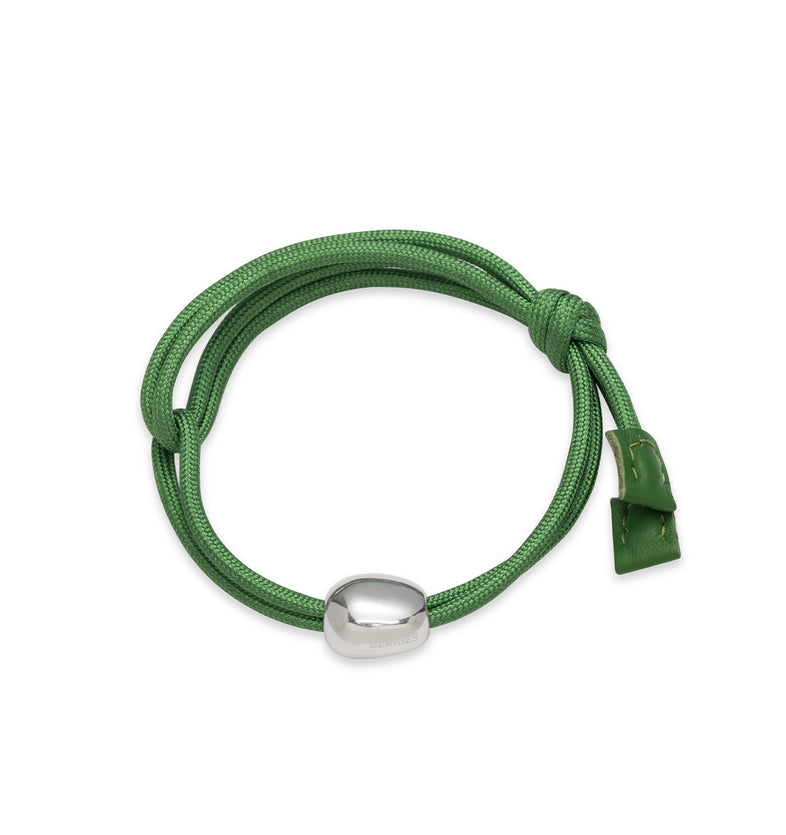  A green nylon rope bracelet with a pendant 