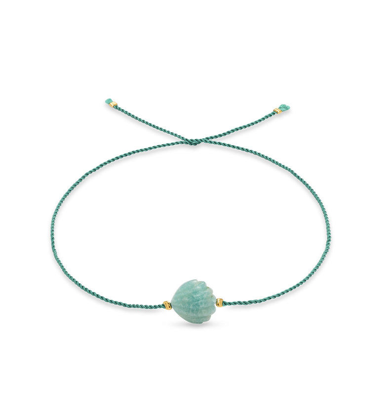  An ankle bracelet on a green string with a shell 3 