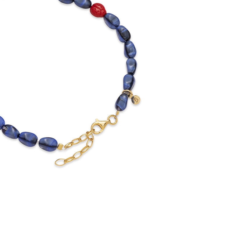  An anklet made of blue beads 2 