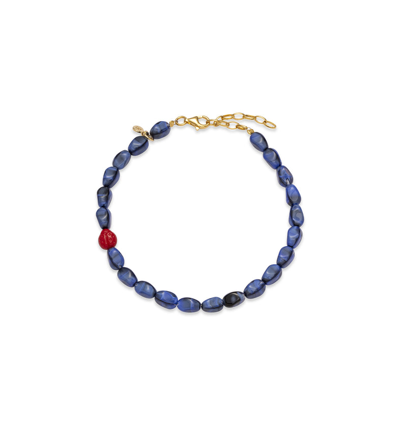  An anklet made of blue beads 