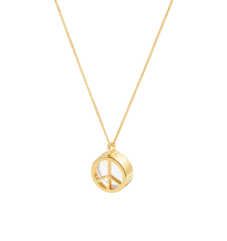  A fine gold-plated necklace with a peace symbol and a rock crystal 
