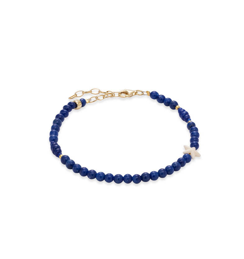  Bransoletka z drobnych granatowych koralików żywicznych, złocone elementy i srebrne zapięcie z karabińczykiem 