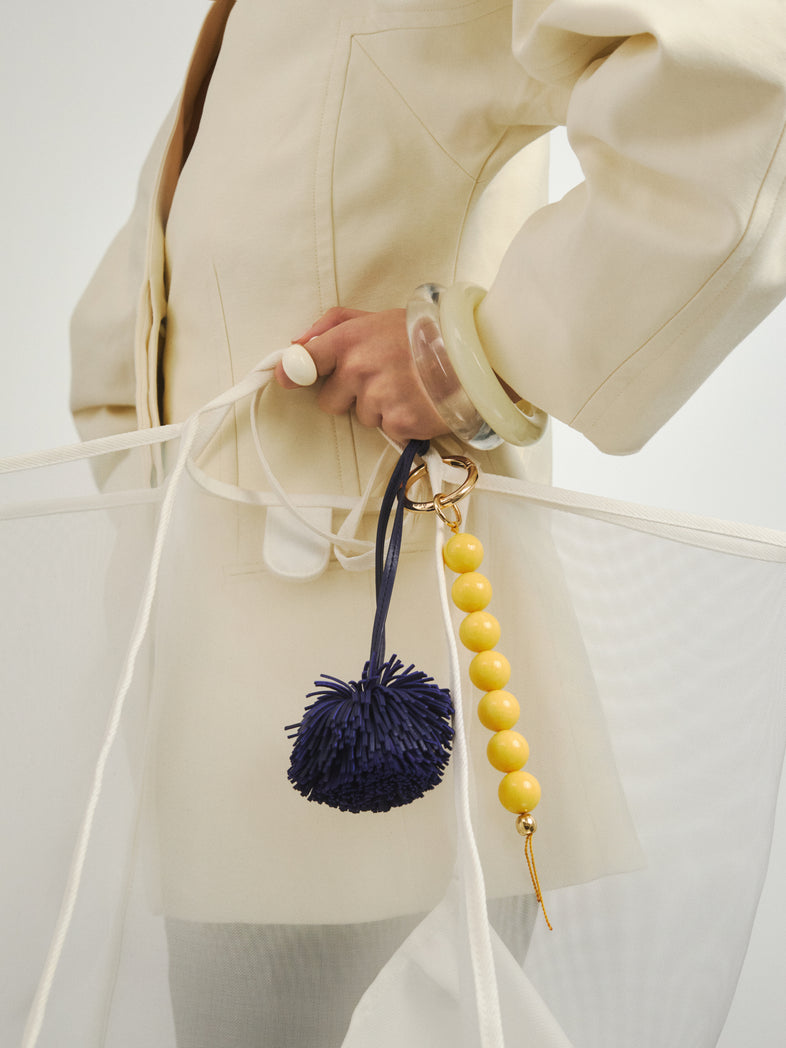  Granatowy brelok pompon ze skóry - set z żółtym brelokiem z żywicy 