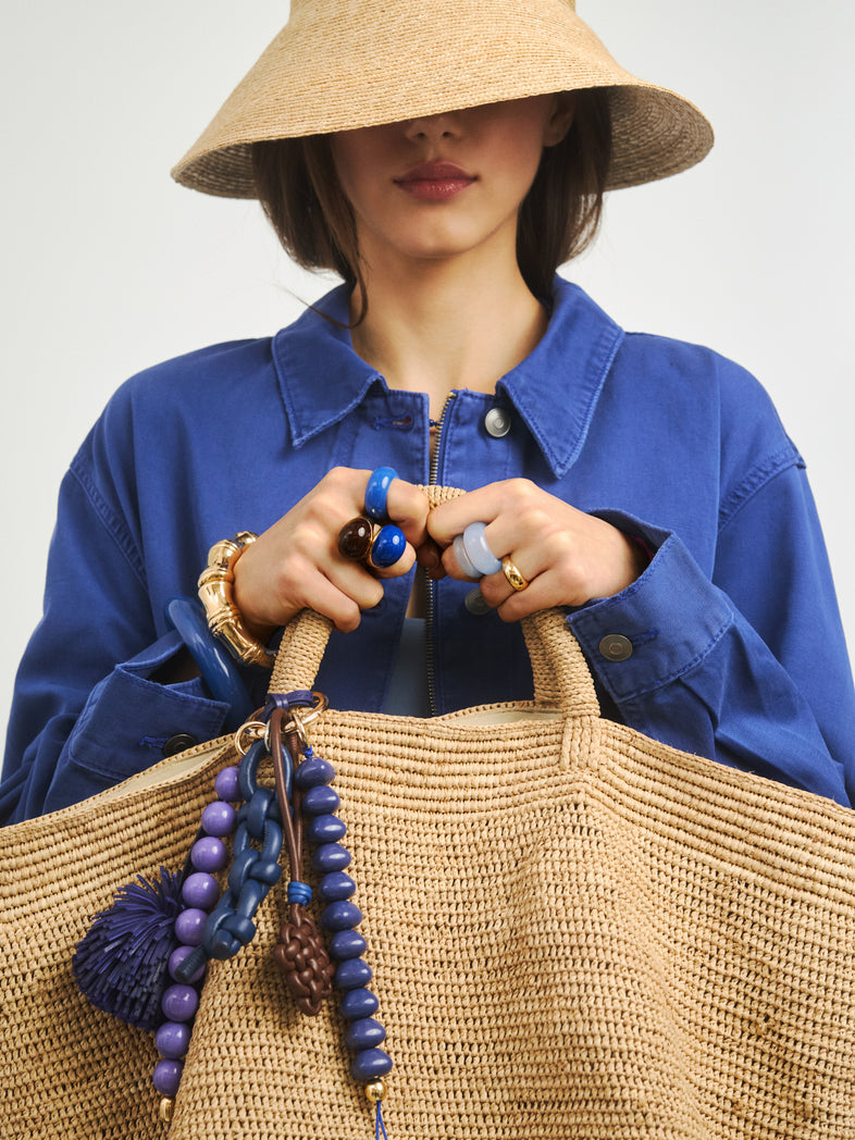  Niebieski pleciony brelok do torebki ze skóry ze srebrnym karabińczykiem - set z brelokami z kolekcji Cosmo 