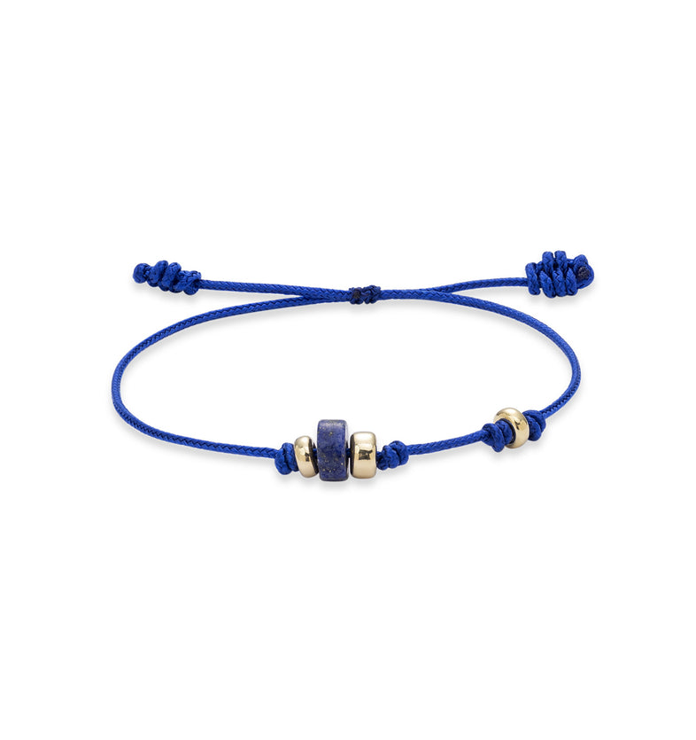  Niebieska bransoletka na sznurku z  sodalitem i pozłacanymi kulkami ze srebra 925 