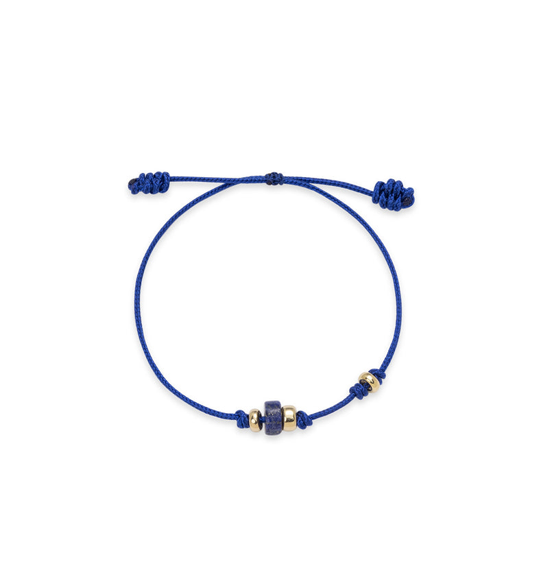  Niebieska bransoletka na sznurku z naturalnym sodalitem i pozłacanymi kulkami ze srebra 925 